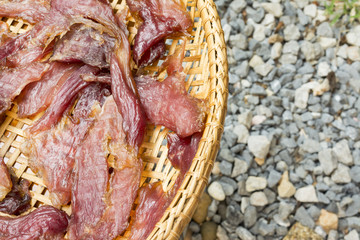 Sun dried beef on the threshing basket