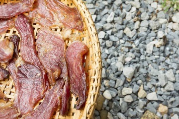 Sun dried beef on the threshing basket