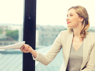 happy woman with documents