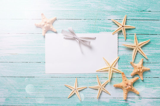 Marine items on wooden background.