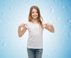 smiling little girl in blank white t-shirt