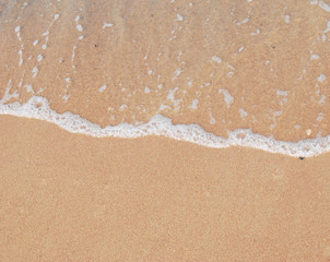 Fototapeta na wymiar Sand beach and wave