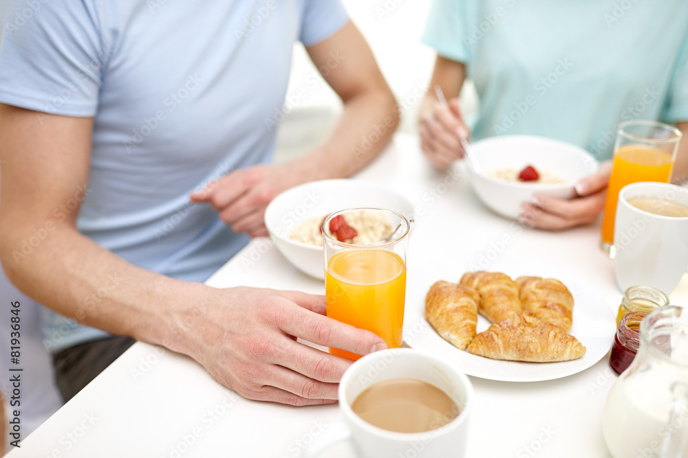 Poster close up of couple having breakfast at home