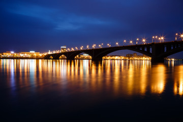 Fototapeta na wymiar Decline, river Yenisei, municipal bridge view of the city
