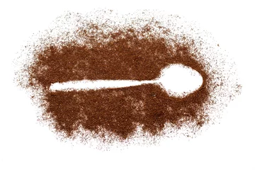 Photo sur Aluminium Chocolat Spoon trace in ground coffee