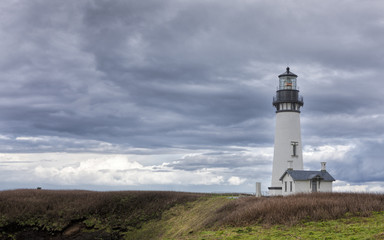 Fototapeta na wymiar Yaquina bay lighthouse in Newport, Oregon.