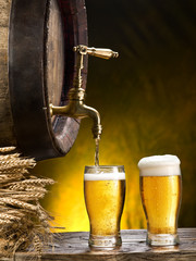 Pin of beer and glass of beer.