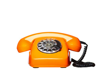 Classic dial phone isolated on white