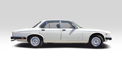 Obraz na płótnie Canvas British premium classic car side view isolated on white