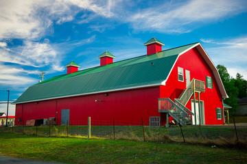 Long Red Barn with Green Roof