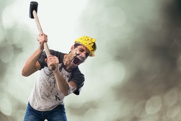 Background. Young dirty Worker Man With Hard Hat helmet  holding