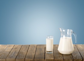 Milk. Milk and sunny spring field