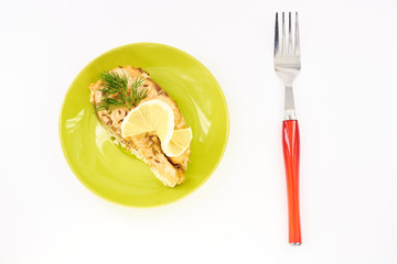 Fish stew on a green plate