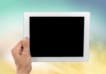 Ipad. Holding and showing digital tablet