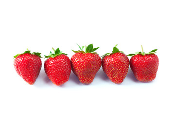 Ripe strawberries on white background