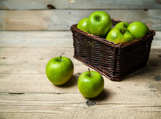 fruit. apples in a basket on wooden table