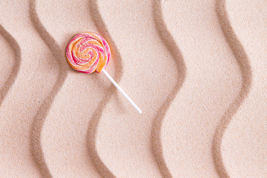 Nothing Tastes Crunchier Than A Sandy Lollipop At The Beach