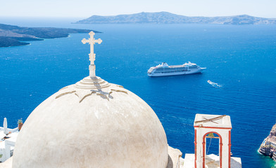 old church with sea liner on Santorini in Greece