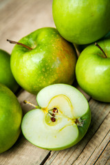 fruit. green apples on wooden background