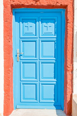 blue door on Santorini in Greece