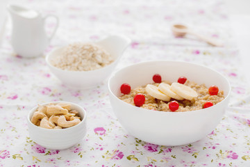 Oatmeal with banana and cinnamon. Healthy food.