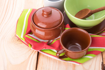 plates and cups on wooden table