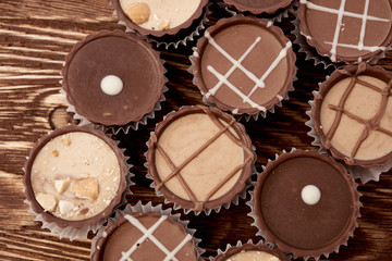 Dark chocolate on wooden background