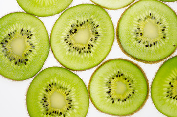 Fototapeta premium sliced of green kiwi fruit kiwi fruit on white background