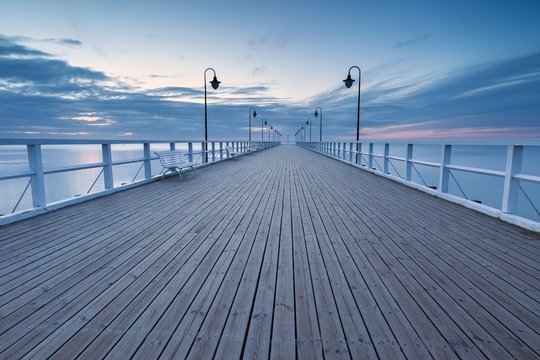 Beautiful long exposure seascape with wooden pier © milosz_g