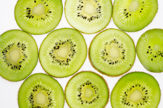 sliced of green kiwi fruit kiwi fruit on white background