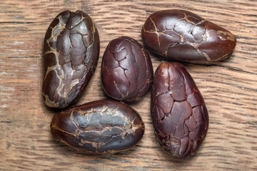 dark roasted cocoa beans extreme closeup