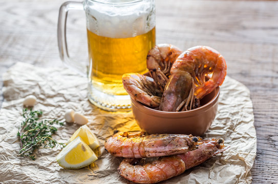 Fried shrimps with glass of beer
