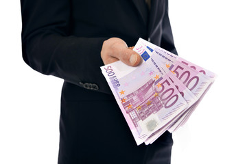 A businessman holding money - Euro (EUR) - isolated