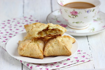 Tasty puff pastry with apple  on plate