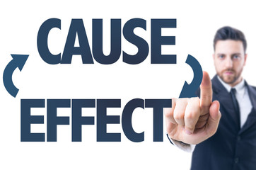 Business man pointing the text: Cause Effect