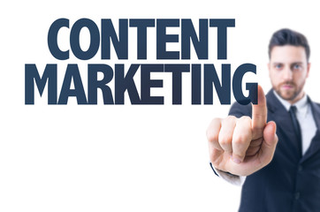 Business man pointing the text: Content Marketing