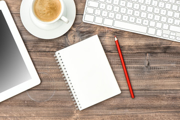 Digital tablet pc, keyboard and cup of coffee. Home office workp