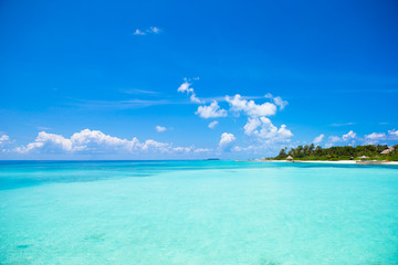 Fototapeta na wymiar Perfect white beach with turquoise water at ideal island