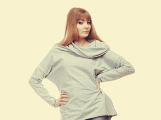 fashionable woman in gray blouse portrait