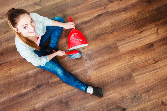 Cleaning Woman Sweeping Wooden Floor