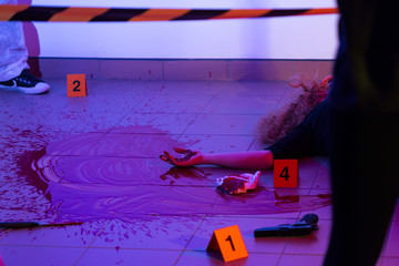 Murder scene with killed woman