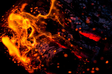 Fototapeta na wymiar Burning fire flame. Defocused background