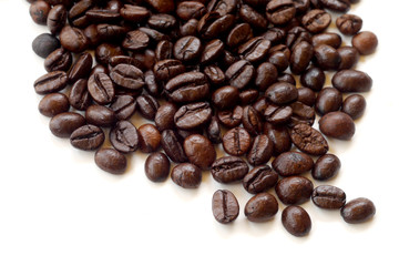 Brown coffee beans isolated on white background