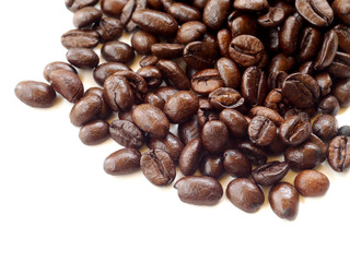 Brown coffee beans isolated on white background