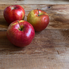 three red ripe apple