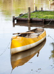 Canoe Moored In Lake