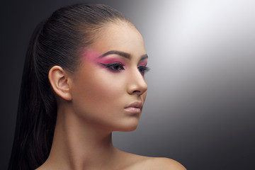 Fototapeta premium ink in the eyes of a beautiful girl