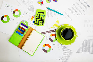  business workplace with financial reports and office stuff