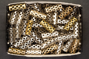 Closeup of Old Hair Rollers in a Box