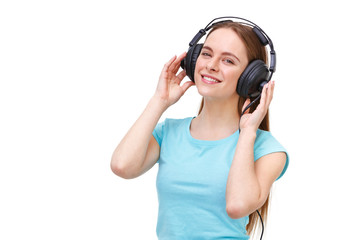 Naklejka premium Young woman with headphones listening to music and dancing - iso